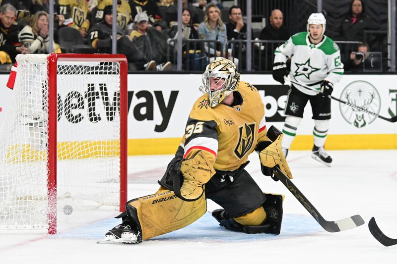 Apr 27, 2024; Las Vegas, Nevada, USA; Vegas Golden Knights goaltender Logan Thompson (36) is scored on by Dallas Stars defenseman Miro Heiskanen (4)(not pictured) in the second period in game three of the first round of the 2024 Stanley Cup Playoffs at T-Mobile Arena. Mandatory Credit: Candice Ward-USA TODAY Sports