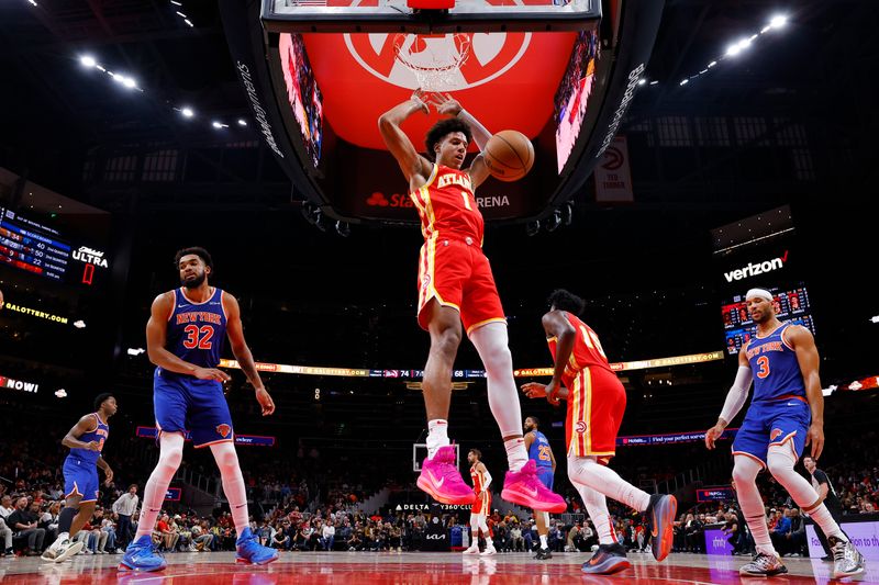 ATLANTA, GEORGIA - NOVEMBER 6: Jalen Johnson #1 of the Atlanta Hawks dunks during the third quarter against the New York Knicks at State Farm Arena on November 6, 2024 in Atlanta, Georgia. NOTE TO USER: User expressly acknowledges and agrees that, by downloading and or using this photograph, User is consenting to the terms and conditions of the Getty Images License Agreement. (Photo by Todd Kirkland/Getty Images)