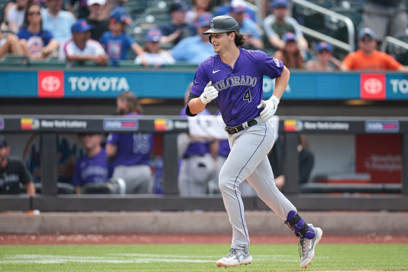 Jul 14, 2024; New York City, New York, USA; Colorado Rockies first baseman Michael Toglia (4) runs the bases after his solo home run during the eighth inning against the New York Mets at Citi Field. Mandatory Credit: Vincent Carchietta-USA TODAY Sports