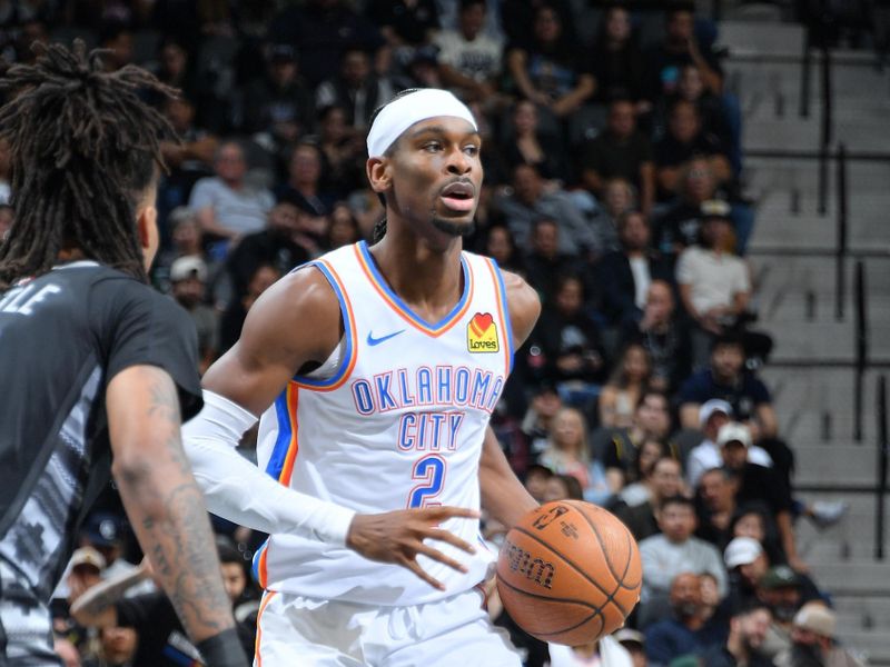 SAN ANTONIO, TX - NOVEMBER 19: Shai Gilgeous-Alexander #2 of the Oklahoma City Thunder dribbles the ball during the game against the San Antonio Spurs during the Emirates NBA Cup game on November 19, 2024 at the Frost Bank Center in San Antonio, Texas. NOTE TO USER: User expressly acknowledges and agrees that, by downloading and or using this photograph, user is consenting to the terms and conditions of the Getty Images License Agreement. Mandatory Copyright Notice: Copyright 2024 NBAE (Photos by Michael Gonzales/NBAE via Getty Images)