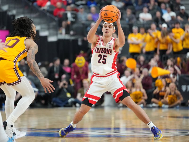 Mar 10, 2023; Las Vegas, NV, USA; Arizona Wildcats guard Kerr Kriisa (25) looks to make a pass against the Arizona State Sun Devils during the second half at T-Mobile Arena. Mandatory Credit: Stephen R. Sylvanie-USA TODAY Sports