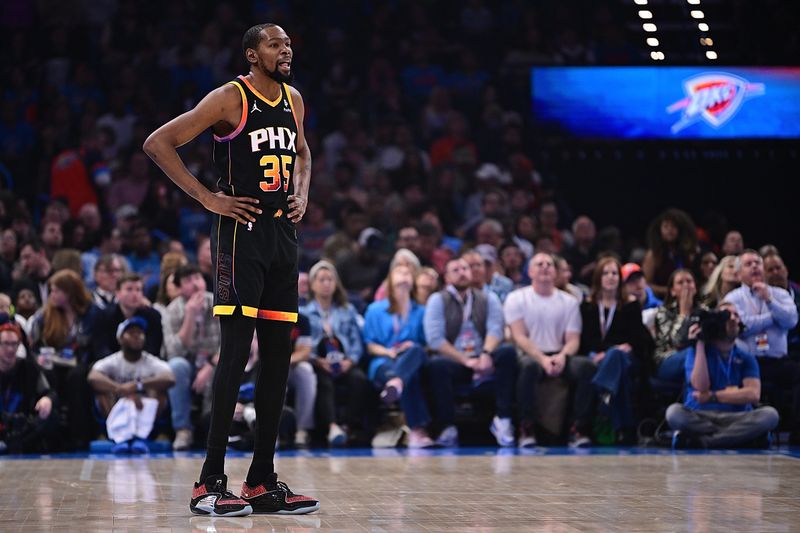 OKLAHOMA CITY, OKLAHOMA - MARCH 29: Kevin Durant #35 of the Phoenix Suns looks on during the first half against the Oklahoma City Thunder at Paycom Center on March 29, 2024 in Oklahoma City, Oklahoma. NOTE TO USER: User expressly acknowledges and agrees that, by downloading and or using this Photograph, user is consenting to the terms and conditions of the Getty Images License Agreement. (Photo by Joshua Gateley/Getty Images)