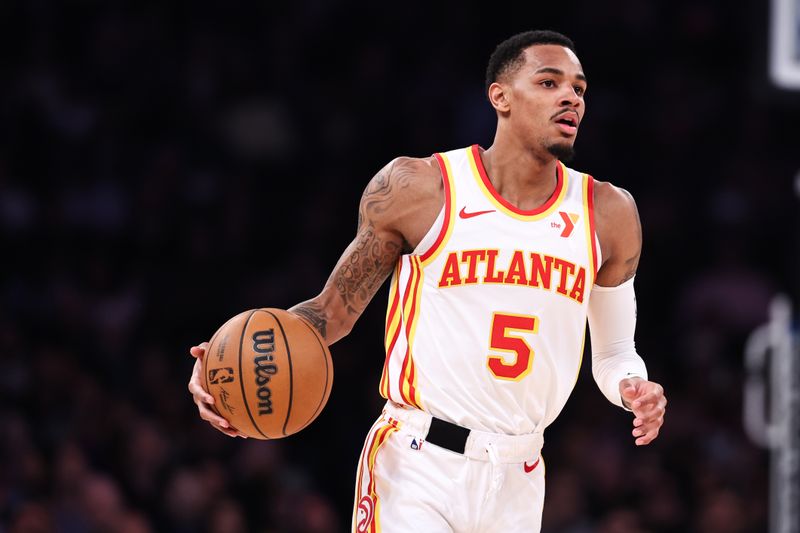 NEW YORK, NEW YORK - MARCH 05: Dejounte Murray #5 of the Atlanta Hawks brings the ball up the court during the first quarter of the game against the New York Knicks at Madison Square Garden on March 05, 2024 in New York City. NOTE TO USER: User expressly acknowledges and agrees that, by downloading and or using this photograph, User is consenting to the terms and conditions of the Getty Images License Agreement. (Photo by Dustin Satloff/Getty Images)