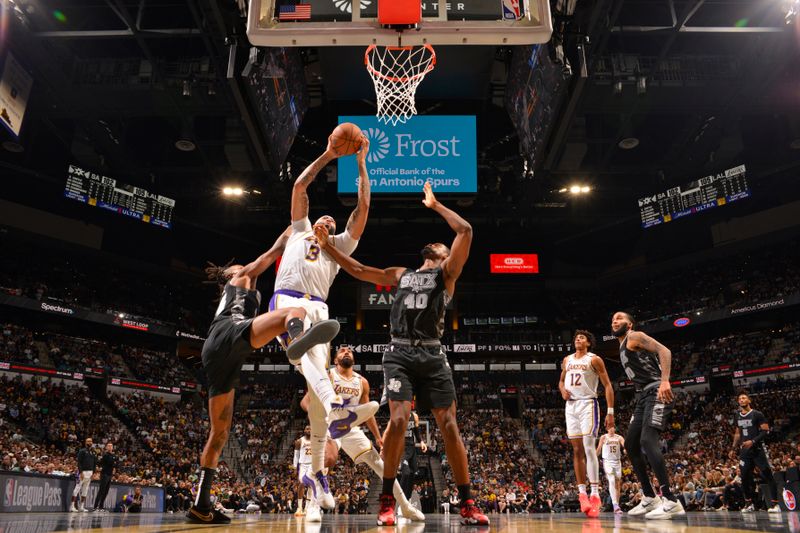 SAN ANTONIO, TX - NOVEMBER 15: Anthony Davis #3 of the Los Angeles Lakers drives to the basket during the game against the San Antonio Spurs during the Emirates NBA Cup game on November 15, 2024 at the Frost Bank Center in San Antonio, Texas. NOTE TO USER: User expressly acknowledges and agrees that, by downloading and or using this photograph, user is consenting to the terms and conditions of the Getty Images License Agreement. Mandatory Copyright Notice: Copyright 2024 NBAE (Photos by Jesse D. Garrabrant/NBAE via Getty Images)