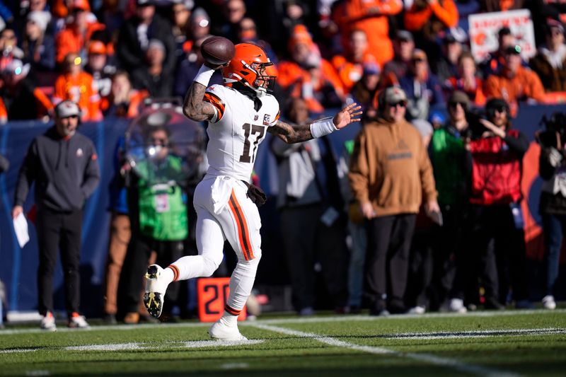 Cleveland Browns quarterback Dorian Thompson-Robinson throws during the first half of an NFL football game against the Denver Broncos on Sunday, Nov. 26, 2023, in Denver. (AP Photo/Jack Dempsey)