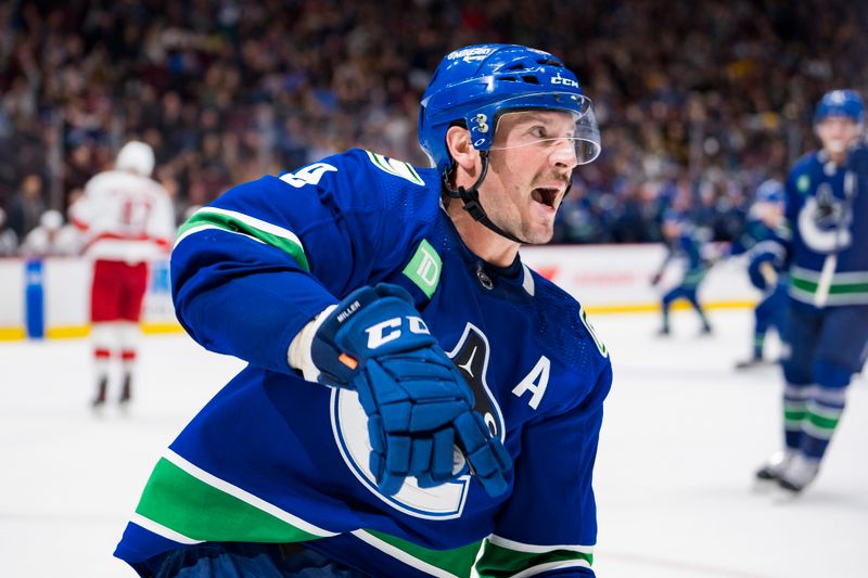 Oct 24, 2022; Vancouver, British Columbia, CAN; Vancouver Canucks forward J.T. Miller (9) celebrates his second goal of the game against Carolina Hurricanes in the third period at Rogers Arena. Carolina won 3-2. Mandatory Credit: Bob Frid-USA TODAY Sports