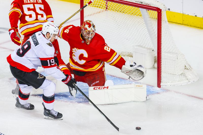 Jan 9, 2024; Calgary, Alberta, CAN; Calgary Flames goaltender Jacob Markstrom (25) guards his net against Ottawa Senators right wing Drake Batherson (19) during the first period at Scotiabank Saddledome. Mandatory Credit: Sergei Belski-USA TODAY Sports