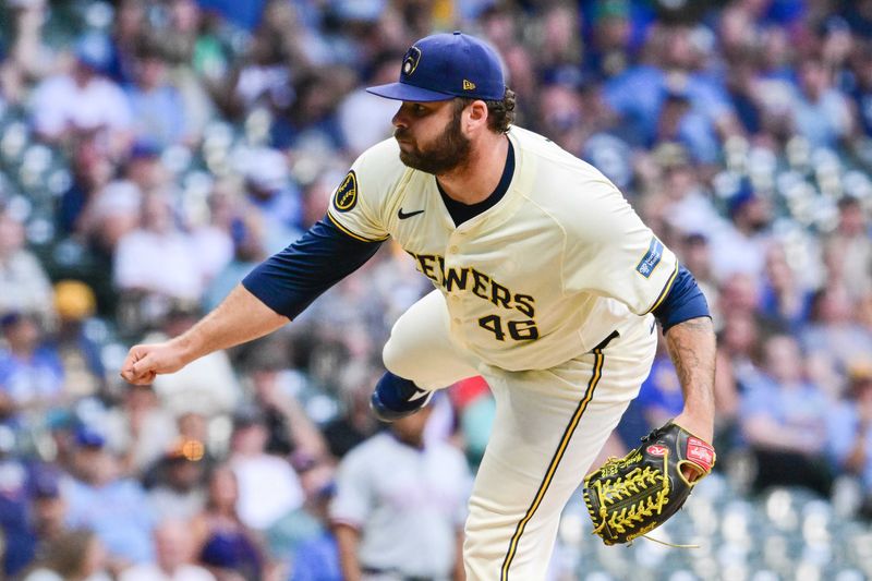 Jun 25, 2024; Milwaukee, Wisconsin, USA; Milwaukee Brewers relief pitcher Bryse Wilson (46) pitches against the Texas Rangers in the third inning at American Family Field. Mandatory Credit: Benny Sieu-USA TODAY Sports