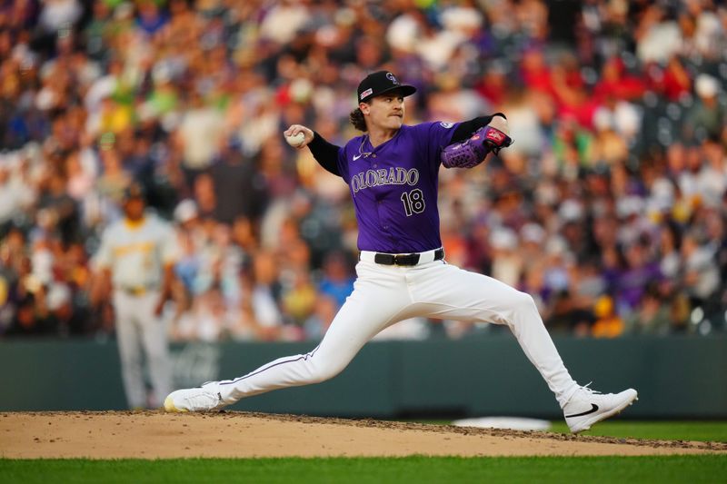 Jun 14, 2024; Denver, Colorado, USA; Colorado Rockies starting pitcher Ryan Feltner (18) delivers a pitch in the fifth inning at Coors Field. Mandatory Credit: Ron Chenoy-USA TODAY Sports