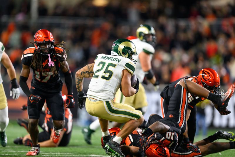 Oct 5, 2024; Corvallis, Oregon, USA; Colorado State Rams running back Avery Morrow (25) runs the ball in overtime against the Oregon State Beavers at Reser Stadium. Mandatory Credit: Craig Strobeck-Imagn Images