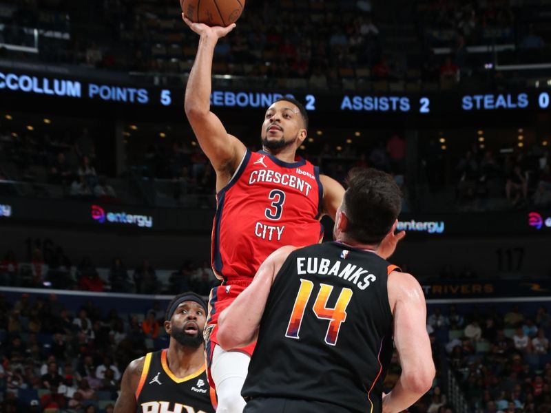 NEW ORLEANS, LA - APRIL 1:  CJ McCollum #3 of the New Orleans Pelicans drives to the basket during the game against the Phoenix Suns on April 1, 2024 at the Smoothie King Center in New Orleans, Louisiana. NOTE TO USER: User expressly acknowledges and agrees that, by downloading and or using this Photograph, user is consenting to the terms and conditions of the Getty Images License Agreement. Mandatory Copyright Notice: Copyright 2024 NBAE (Photo by Layne Murdoch Jr./NBAE via Getty Images)