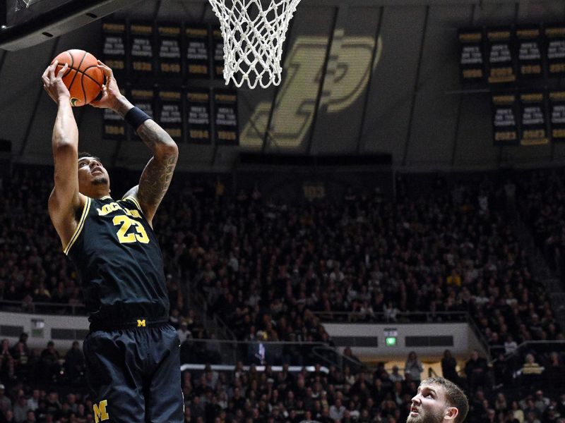 Feb 17, 2026; West Lafayette, Indiana, USA; Michigan Wolverines forward Yaxel Lendeborg (23) shoots the ball in front of Purdue Boilermakers guard Braden Smith (3) during the first half at Mackey Arena. Mandatory Credit: Marc Lebryk-Imagn Images