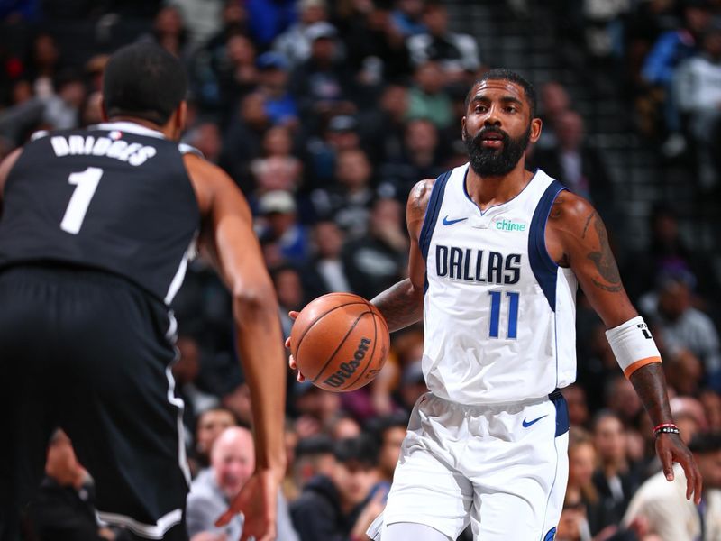 BROOKLYN, NY - FEBRUARY 6: Kyrie Irving #11 of the Dallas Mavericks handles the ball during the game  on February 6, 2024 at Barclays Center in Brooklyn, New York. NOTE TO USER: User expressly acknowledges and agrees that, by downloading and or using this Photograph, user is consenting to the terms and conditions of the Getty Images License Agreement. Mandatory Copyright Notice: Copyright 2024 NBAE (Photo by David L. Nemec/NBAE via Getty Images)