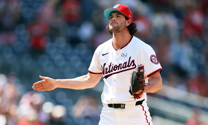 Jun 16, 2024; Washington, District of Columbia, USA; Washington Nationals pitcher Kyle Finnegan (67) celebrates after a game against the Miami Marlins at Nationals Park. Mandatory Credit: Daniel Kucin Jr.-USA TODAY Sports