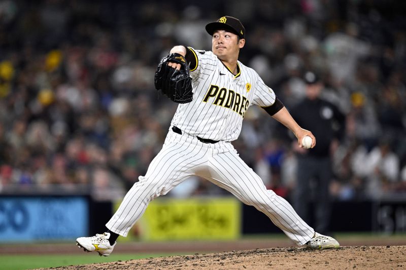 Apr 30, 2024; San Diego, California, USA; San Diego Padres relief pitcher Yuki Matsui (1) throws a pitch against the Cincinnati Reds during the seventh inning at Petco Park. Mandatory Credit: Orlando Ramirez-USA TODAY Sports