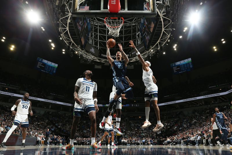 MINNEAPOLIS, MN -  JANUARY 11:  Brandon Clarke #15 of the Memphis Grizzlies drives to the basket during the game against the Minnesota Timberwolves on January 11, 2025 at Target Center in Minneapolis, Minnesota. NOTE TO USER: User expressly acknowledges and agrees that, by downloading and or using this Photograph, user is consenting to the terms and conditions of the Getty Images License Agreement. Mandatory Copyright Notice: Copyright 2025 NBAE (Photo by David Sherman/NBAE via Getty Images)