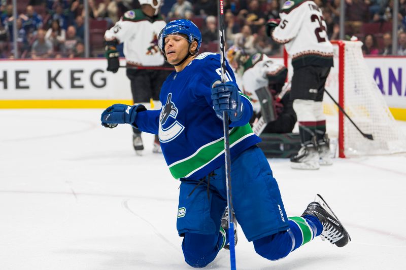 Oct 7, 2022; Vancouver, British Columbia, CAN; Vancouver Canucks forward Dakota Joshua (81) celebrates after scoring a goal against the Arizona Coyotes in the first period at Rogers Arena. Mandatory Credit: Bob Frid-USA TODAY Sports