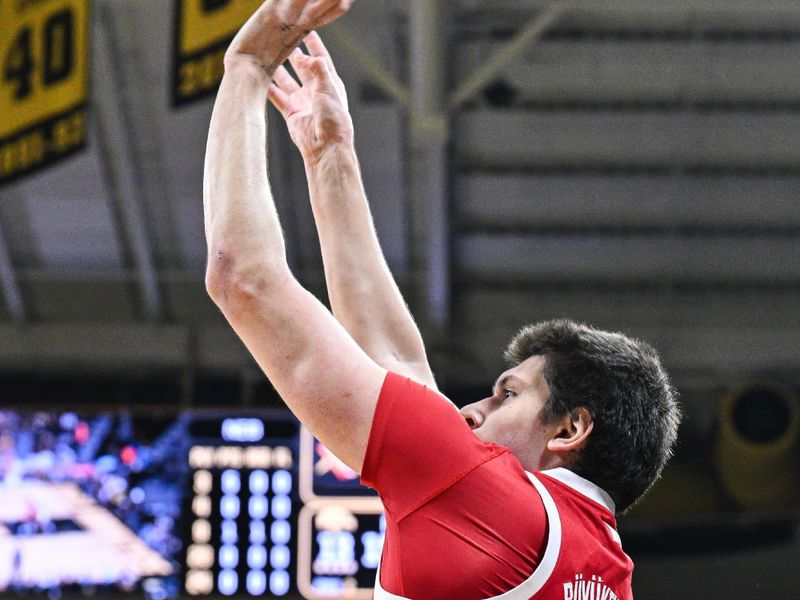 Jan 7, 2025; Iowa City, Iowa, USA; Nebraska Cornhuskers forward Berke Buyuktuncel (9) shoots the ball against the Iowa Hawkeyes during the first half at Carver-Hawkeye Arena. Mandatory Credit: Jeffrey Becker-Imagn Images