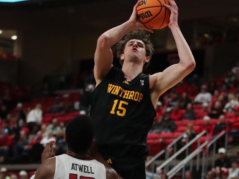Dec 28, 2025; Lubbock, Texas, USA;  Winthrop Eagles forward Tommy Kamarad (15) shoots over Texas Tech Red Raiders guard Donovan Atwell (12) in the second half at United Supermarkets Arena. Mandatory Credit: Michael C. Johnson-Imagn Images