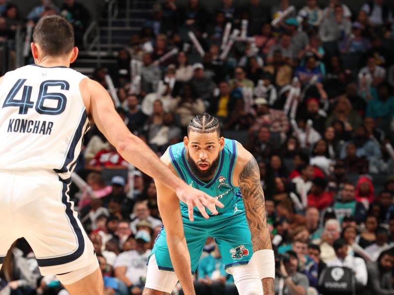 CHARLOTTE, NC - FEBRUARY 10:  Cody Martin #11 of the Charlotte Hornets handles the ball during the game  on February 10, 2024 at Spectrum Center in Charlotte, North Carolina. NOTE TO USER: User expressly acknowledges and agrees that, by downloading and or using this photograph, User is consenting to the terms and conditions of the Getty Images License Agreement.  Mandatory Copyright Notice:  Copyright 2024 NBAE (Photo by Kent Smith/NBAE via Getty Images)