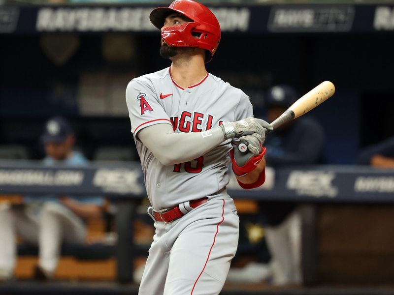 Sep 21, 2023; St. Petersburg, Florida, USA; Los Angeles Angels right fielder Randal Grichuk (15) singles during the third inning against the Tampa Bay Rays at Tropicana Field. Mandatory Credit: Kim Klement Neitzel-USA TODAY Sports