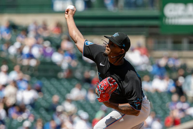 May 5, 2023; Chicago, Illinois, USA; Miami Marlins starting pitcher Edward Cabrera (27) pitches against the Chicago Cubs during the first inning at Wrigley Field. Mandatory Credit: Kamil Krzaczynski-USA TODAY Sports