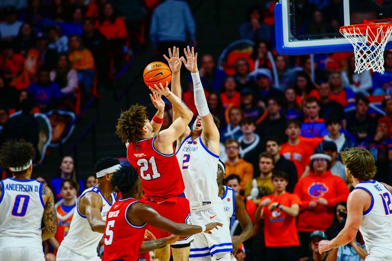 Feb 17, 2024; Boise, Idaho, USA; Fresno State Bulldogs guard Isaiah Pope (21) shoots over Boise State Broncos forward Tyson Degenhart (2) during the second half  at ExtraMile Arena. Boise State defeats Fresno State 90-66.  Mandatory Credit: Brian Losness-USA TODAY Sports
