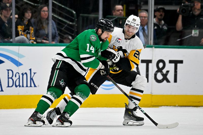 Mar 22, 2024; Dallas, Texas, USA; Dallas Stars left wing Jamie Benn (14) and Pittsburgh Penguins center Lars Eller (20) look for the puck during the third period at the American Airlines Center. Mandatory Credit: Jerome Miron-USA TODAY Sports