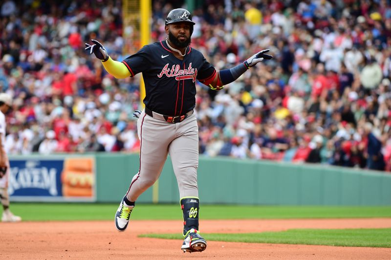 May 18, 2025; Boston, Massachusetts, USA; Atlanta Braves designated hitter Marcell Ozuna (20) reacts rounding the bases after hitting a three run home run during the eighth inning against the Boston Red Sox at Fenway Park. Mandatory Credit: Bob DeChiara-Imagn Images