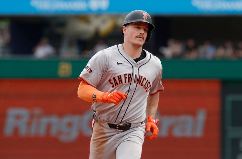 May 23, 2024; Pittsburgh, Pennsylvania, USA; San Francisco Giants third baseman Matt Chapman (26) circles the bases on a three run home run against the Pittsburgh Pirates during the ninth inning at PNC Park. The Giants won 7-6. Mandatory Credit: Charles LeClaire-USA TODAY Sports