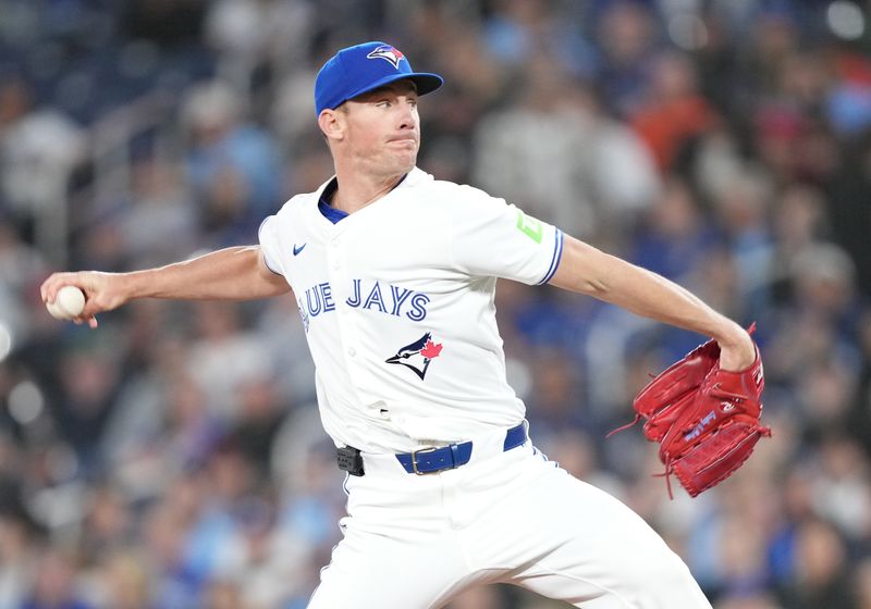 Apr 26, 2024; Toronto, Ontario, CAN; Toronto Blue Jays starting pitcher Chris Bassitt (40) throws a pitch against the Los Angeles Dodgers during the first inning at Rogers Centre. Mandatory Credit: Nick Turchiaro-USA TODAY Sports