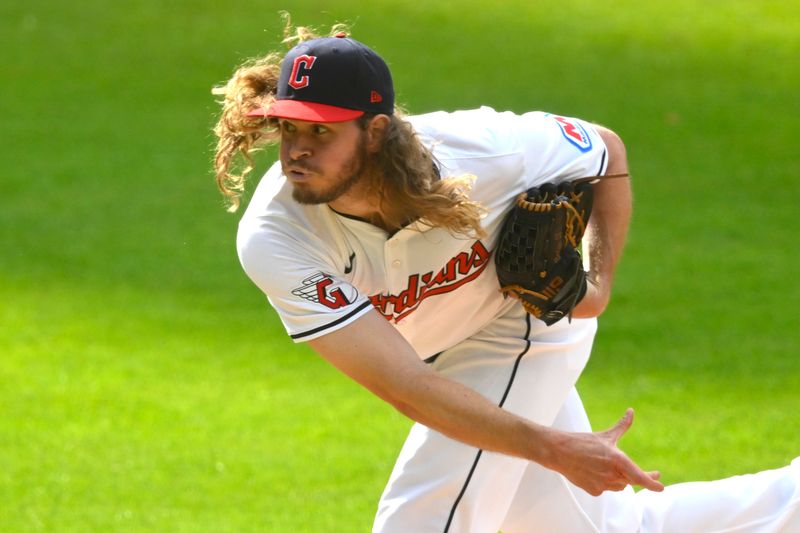 Jul 6, 2024; Cleveland, Ohio, USA; Cleveland Guardians relief pitcher Scott Barlow (58) delivers a pitch in the fifth inning against the San Francisco Giants at Progressive Field. Mandatory Credit: David Richard-USA TODAY Sports