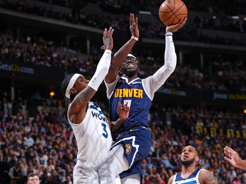 DENVER, CO - APRIL 10: Reggie Jackson #7 of the Denver Nuggets drives to the basket during the game against the Minnesota Timberwolves on April 10, 2024 at the Ball Arena in Denver, Colorado. NOTE TO USER: User expressly acknowledges and agrees that, by downloading and/or using this Photograph, user is consenting to the terms and conditions of the Getty Images License Agreement. Mandatory Copyright Notice: Copyright 2024 NBAE (Photo by Garrett Ellwood/NBAE via Getty Images)