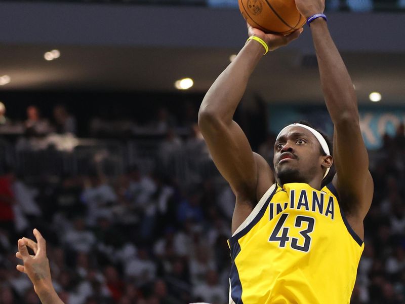 MILWAUKEE, WISCONSIN - APRIL 23: Pascal Siakam #43 of the Indiana Pacers shoots over Patrick Beverley #21 of the Milwaukee Bucks during the first half of game two of the Eastern Conference First Round Playoffs at Fiserv Forum on April 23, 2024 in Milwaukee, Wisconsin. NOTE TO USER: User expressly acknowledges and agrees that, by downloading and or using this photograph, User is consenting to the terms and conditions of the Getty Images License Agreement. (Photo by Stacy Revere/Getty Images)