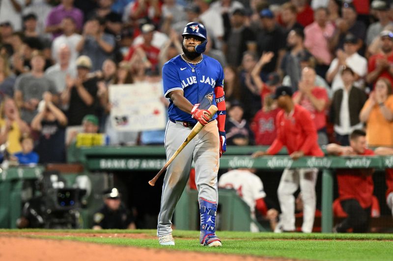 Aug 27, 2024; Boston, Massachusetts, USA; Toronto Blue Jays first baseman Vladimir Guerrero Jr. (27) walks off of the field after a game against the Boston Red Sox at Fenway Park. Mandatory Credit: Brian Fluharty-USA TODAY Sports