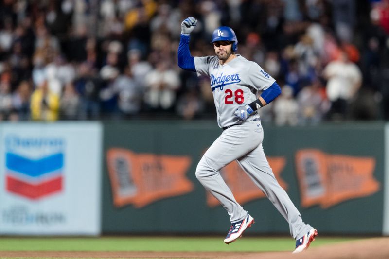 Sep 29, 2023; San Francisco, California, USA; Los Angeles Dodgers designated hitter J.D. Martinez (28) reacts after hitting a three-run home run against the San Francisco Giants during the sixth inning at Oracle Park. Mandatory Credit: John Hefti-USA TODAY Sports