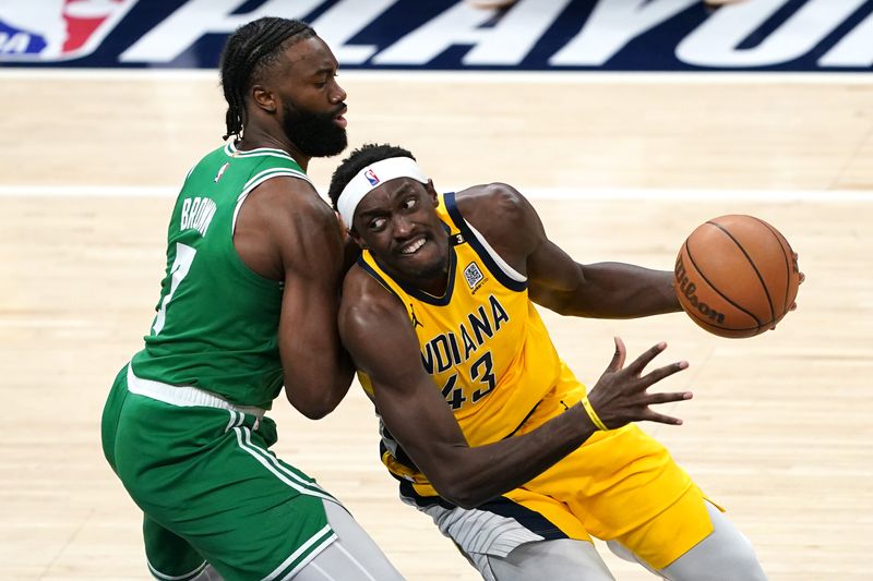 INDIANAPOLIS, INDIANA - MAY 27: Pascal Siakam #43 of the Indiana Pacers drives against Jaylen Brown #7 of the Boston Celtics during the second quarter in Game Four of the Eastern Conference Finals at Gainbridge Fieldhouse on May 27, 2024 in Indianapolis, Indiana. NOTE TO USER: User expressly acknowledges and agrees that, by downloading and or using this photograph, User is consenting to the terms and conditions of the Getty Images License Agreement. (Photo by Dylan Buell/Getty Images)