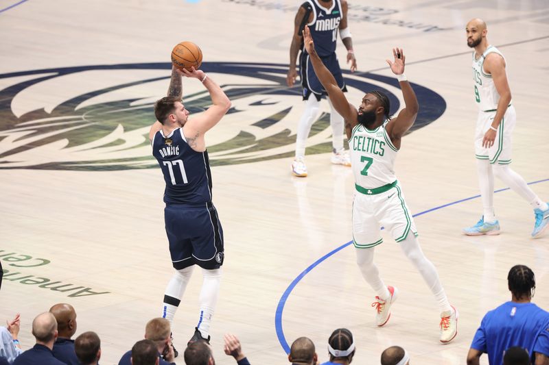 DALLAS, TX - JUNE 14:  Luka Doncic #77 of the Dallas Mavericks shoots the ball during the game against the Boston Celtics during Game 4 of the 2024 NBA Finals on June 14, 2024 at the American Airlines Center in Dallas, Texas. NOTE TO USER: User expressly acknowledges and agrees that, by downloading and or using this photograph, User is consenting to the terms and conditions of the Getty Images License Agreement. Mandatory Copyright Notice: Copyright 2024 NBAE (Photo by Joe Murphy/NBAE via Getty Images)