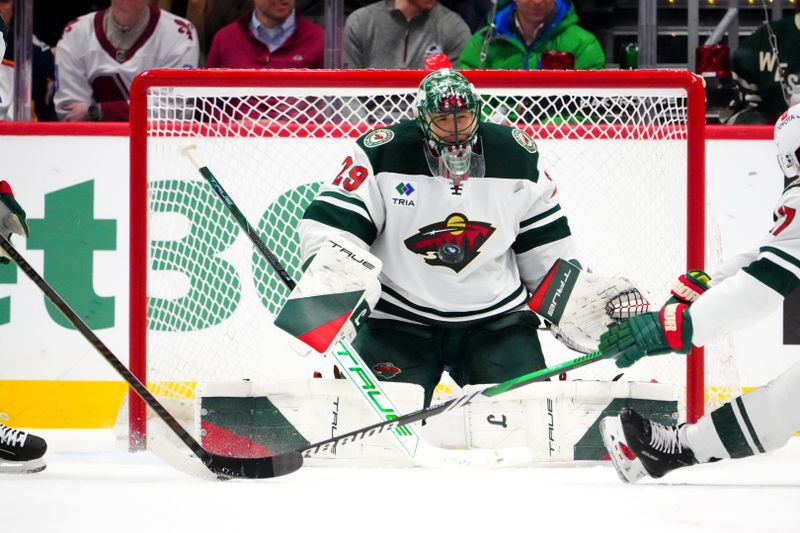 Jan 20, 2025; Denver, Colorado, USA; Minnesota Wild goaltender Marc-Andre Fleury (29) makes a save in the third period against the Colorado Avalanche at Ball Arena. Mandatory Credit: Ron Chenoy-Imagn Images