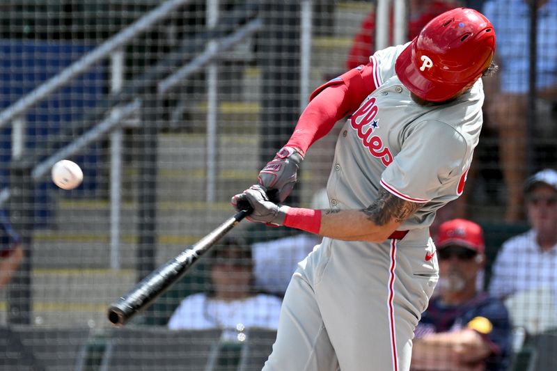 Mar 3, 2024; North Port, Florida, USA; Philadelphia Phillies right fielder Dave Cave (44) hits a single in the second inning of the spring training game against the Atlanta Braves at CoolToday Park. Mandatory Credit: Jonathan Dyer-USA TODAY Sports