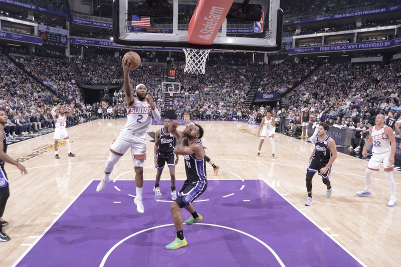SACRAMENTO, CA - NOVEMBER 13: Josh Okogie #2 of the Phoenix Suns drives to the basket during the game against the Sacramento Kings on November 13, 2024 at Golden 1 Center in Sacramento, California. NOTE TO USER: User expressly acknowledges and agrees that, by downloading and or using this Photograph, user is consenting to the terms and conditions of the Getty Images License Agreement. Mandatory Copyright Notice: Copyright 2024 NBAE (Photo by Rocky Widner/NBAE via Getty Images)