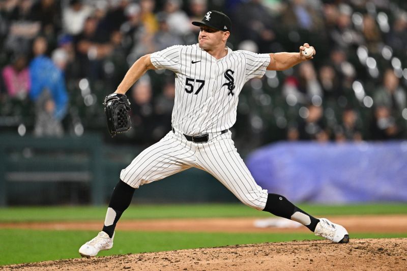 May 28, 2024; Chicago, Illinois, USA;  Chicago White Sox pitcher Tanner Banks (57) pitches in the seventh inning against the Toronto Blue Jays at Guaranteed Rate Field. Mandatory Credit: Jamie Sabau-USA TODAY Sports