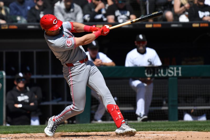 Apr 13, 2024; Chicago, Illinois, USA; Cincinnati Reds left fielder Spencer Steer (7) hits a three-run double during the second inning against the Chicago White Sox at Guaranteed Rate Field. Mandatory Credit: Patrick Gorski-USA TODAY Sports