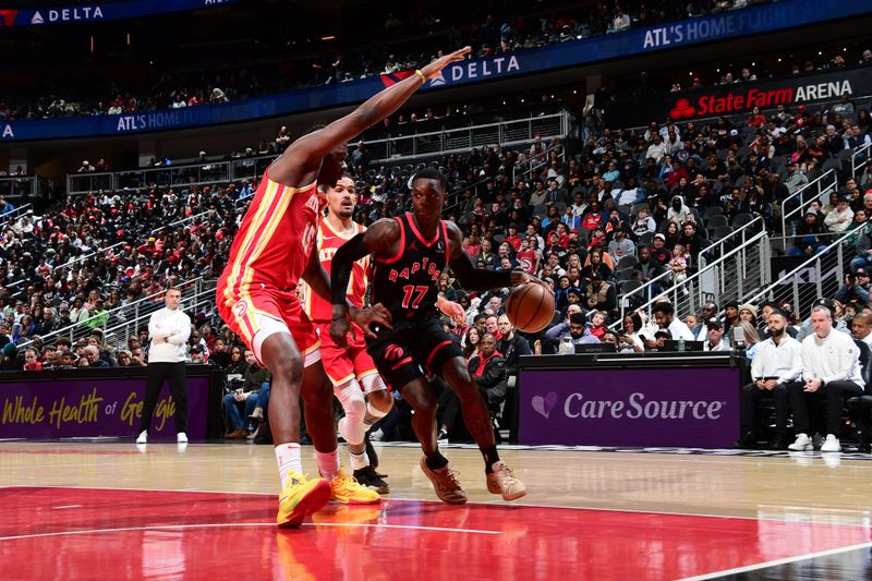 ATLANTA, GA - JANUARY 28: Dennis Schroder #17 of the Toronto Raptors drives to the basket during the game against the Atlanta Hawks on January 28, 2024 at State Farm Arena in Atlanta, Georgia.  NOTE TO USER: User expressly acknowledges and agrees that, by downloading and/or using this Photograph, user is consenting to the terms and conditions of the Getty Images License Agreement. Mandatory Copyright Notice: Copyright 2024 NBAE (Photo by Scott Cunningham/NBAE via Getty Images)