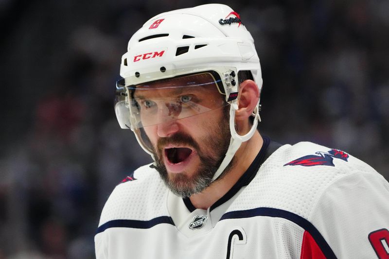 Jan 24, 2023; Denver, Colorado, USA; Washington Capitals left wing Alex Ovechkin (8) calls out in the third period against the Colorado Avalanche at Ball Arena. Mandatory Credit: Ron Chenoy-USA TODAY Sports