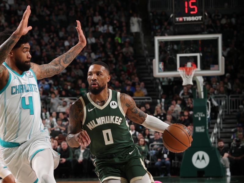 MILWAUKEE, WI - FEBRUARY 9: Damian Lillard #0 of the Milwaukee Bucks handles the ball during the game against the Charlotte Hornets on February 9, 2024 at the Fiserv Forum Center in Milwaukee, Wisconsin. NOTE TO USER: User expressly acknowledges and agrees that, by downloading and or using this Photograph, user is consenting to the terms and conditions of the Getty Images License Agreement. Mandatory Copyright Notice: Copyright 2024 NBAE (Photo by Gary Dineen/NBAE via Getty Images).