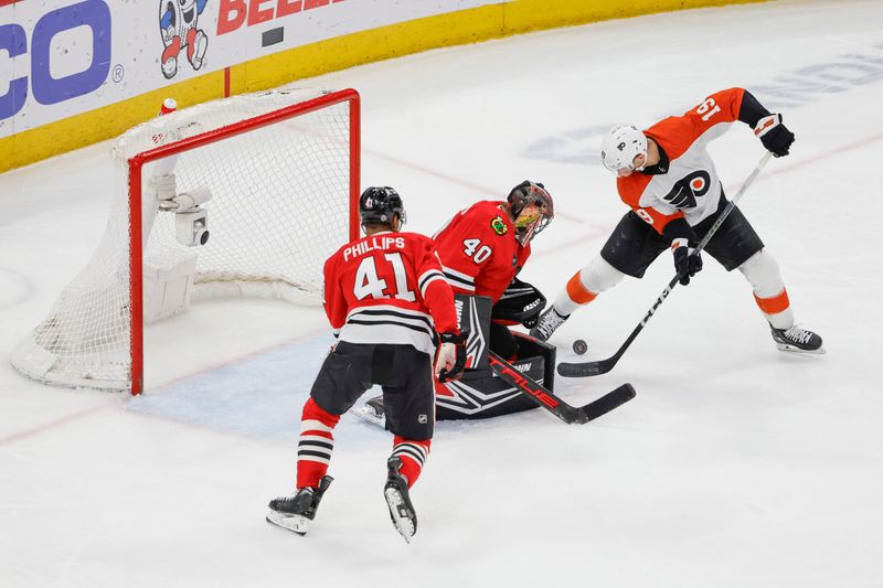 Feb 21, 2024; Chicago, Illinois, USA; Philadelphia Flyers right wing Garnet Hathaway (19) shoots and scores against the Chicago Blackhawks during the second period at United Center. Mandatory Credit: Kamil Krzaczynski-USA TODAY Sports