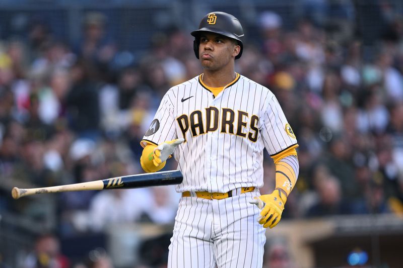 Jun 24, 2023; San Diego, California, USA; San Diego Padres left fielder Juan Soto (22) tosses his bat after a walk against the Washington Nationals during the fifth inning at Petco Park. Mandatory Credit: Orlando Ramirez-USA TODAY Sports