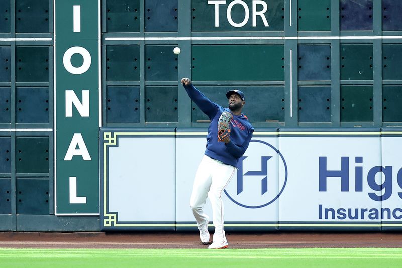 May 23, 2025; Houston, Texas, USA; Houston Astros designated hitter Yordan Alvarez (44) warms up prior to the game against the Seattle Mariners at Daikin Park. Mandatory Credit: Erik Williams-Imagn Images