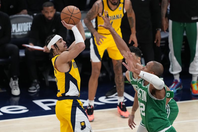 INDIANAPOLIS, INDIANA - MAY 27: Andrew Nembhard #2 of the Indiana Pacers shoots over Al Horford #42 of the Boston Celtics during the fourth quarter in Game Four of the Eastern Conference Finals at Gainbridge Fieldhouse on May 27, 2024 in Indianapolis, Indiana. NOTE TO USER: User expressly acknowledges and agrees that, by downloading and or using this photograph, User is consenting to the terms and conditions of the Getty Images License Agreement. (Photo by Dylan Buell/Getty Images)